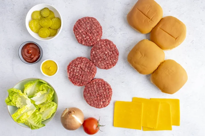 Beef burger box contents: burgers, buns, cheddar, salad and sauces