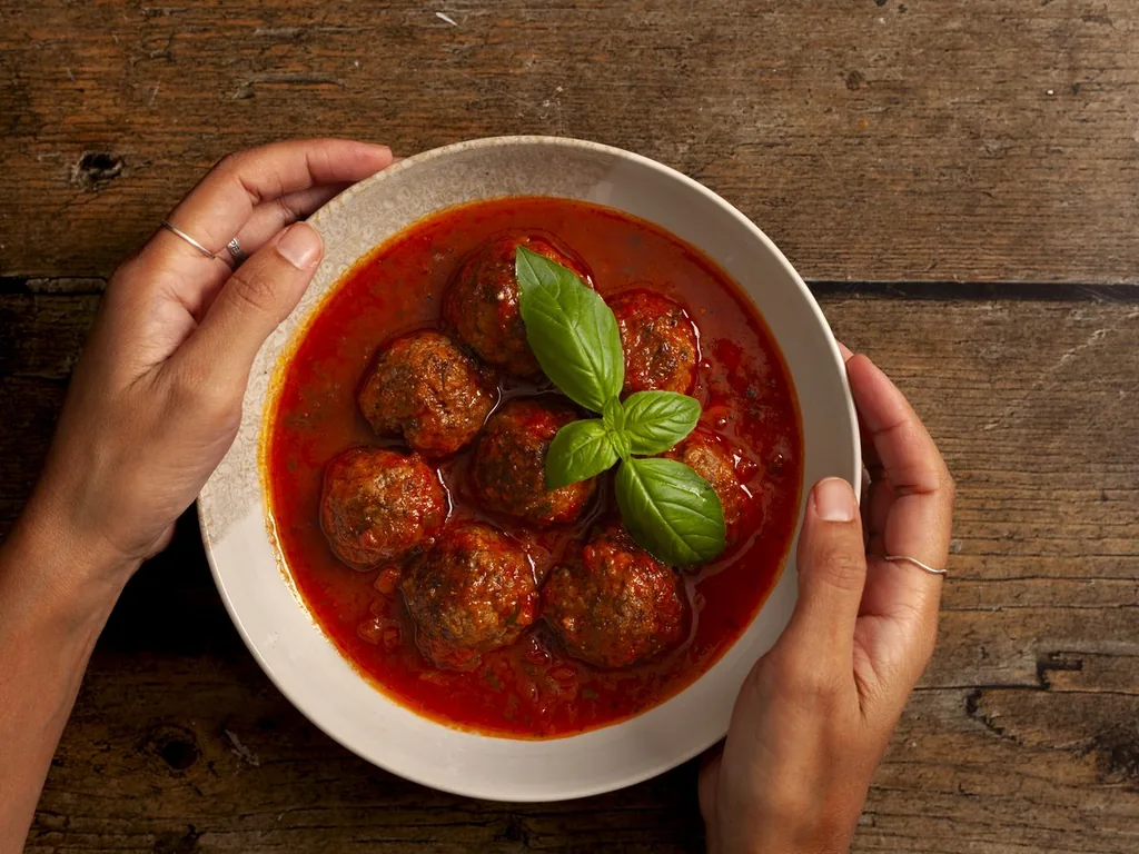 Meatballs shaped by hand.