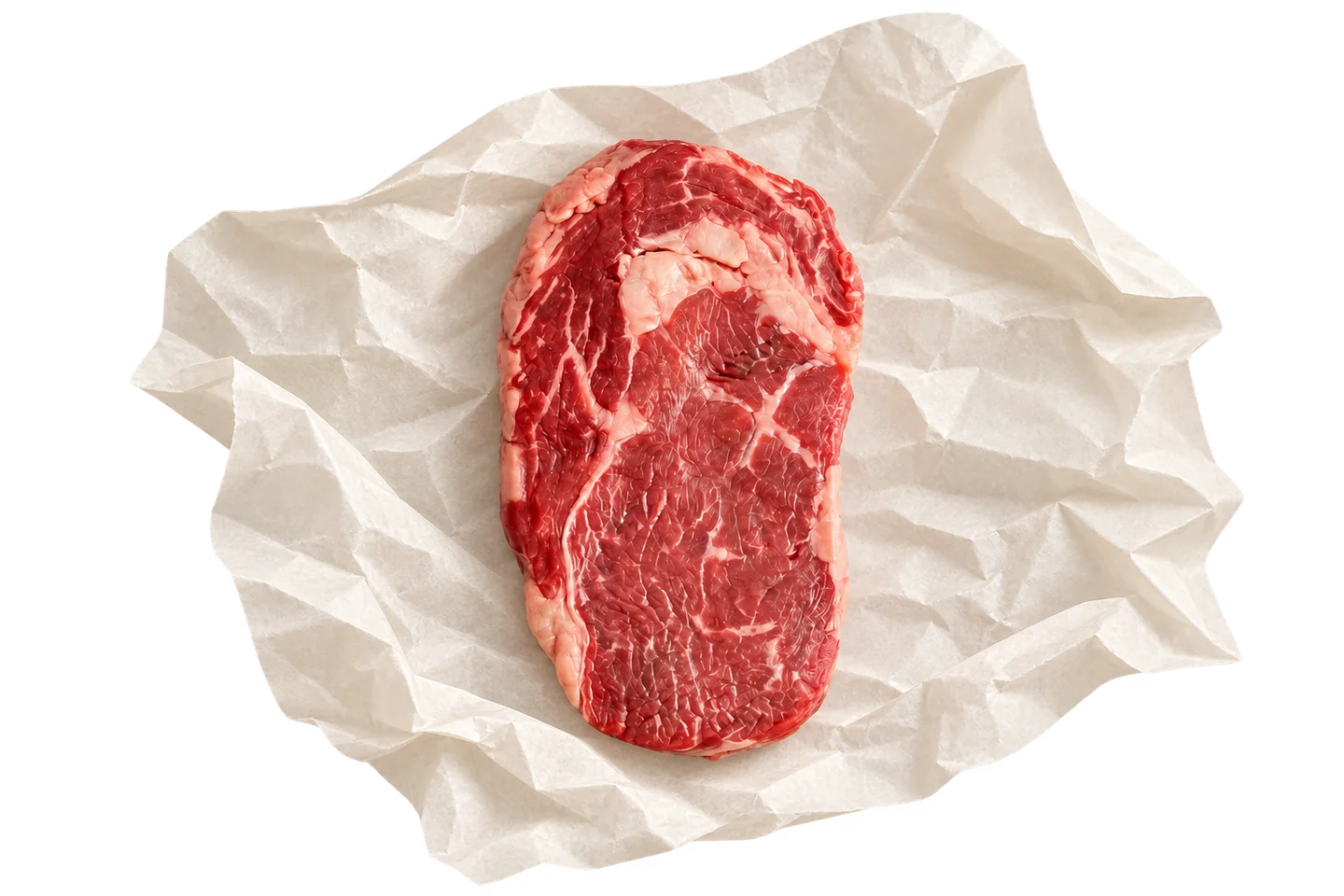 Marbled ribeye on folded butcher paper with rosemary